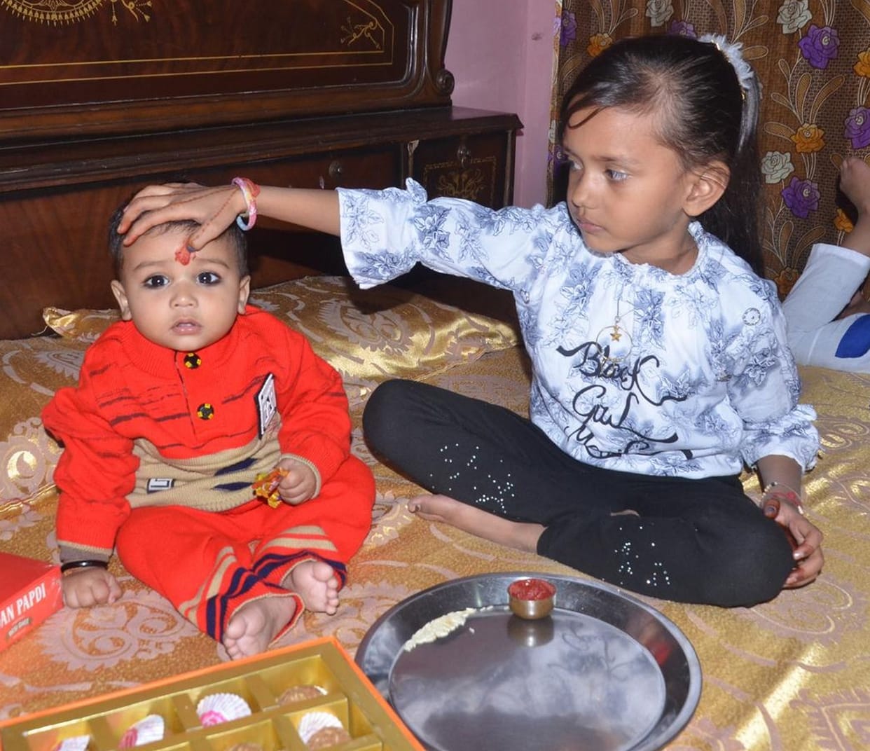 Aligarh: Bhai Dooj: Sisters blessed with long life by applying tilak