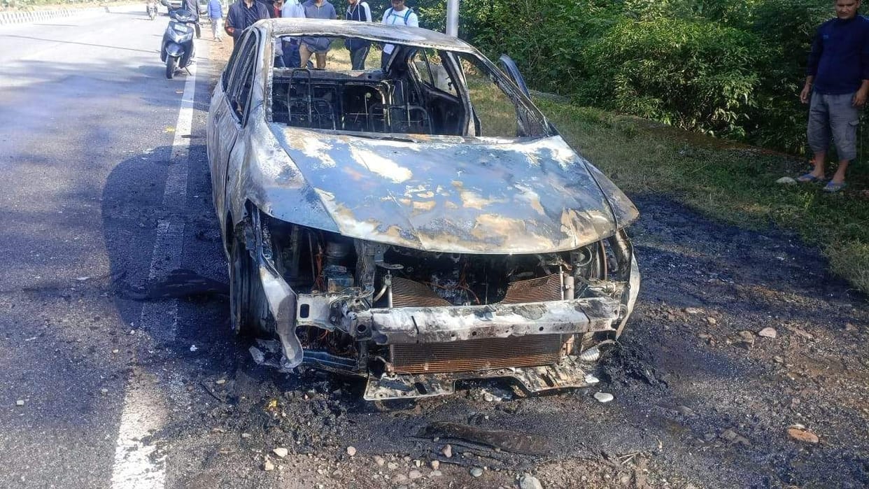Fire in moving car near Jollygrant Airport