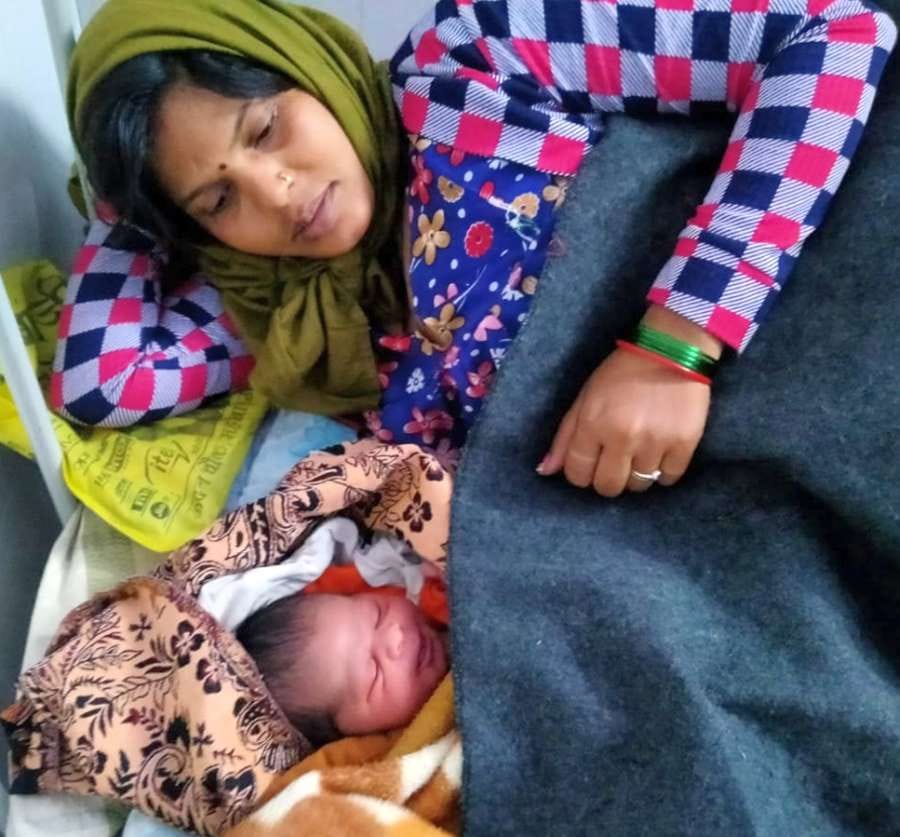 By bringing food from home, the caretakers are filling the stomach of the pregnant women.