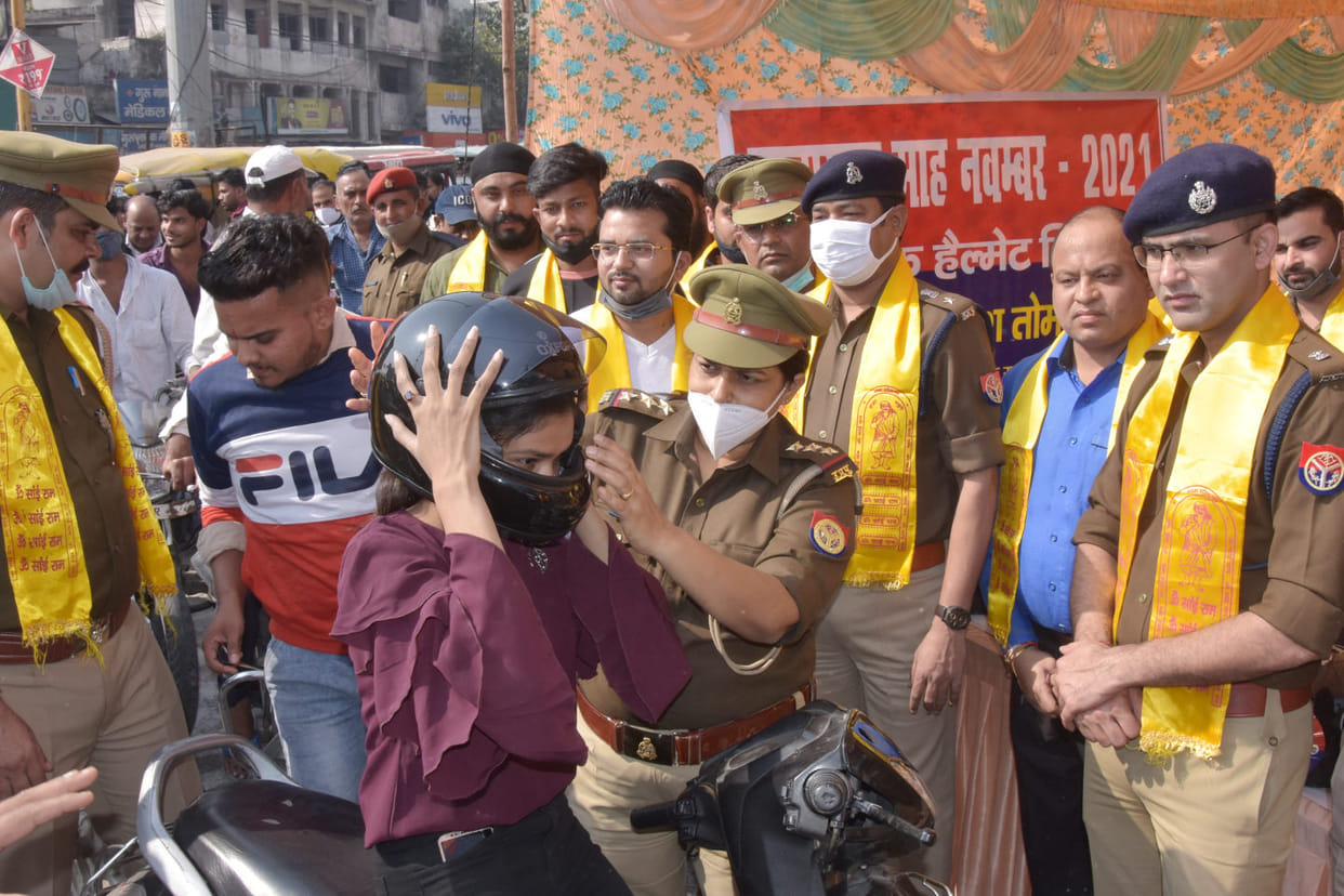 Helmets distributed to two wheeler drivers