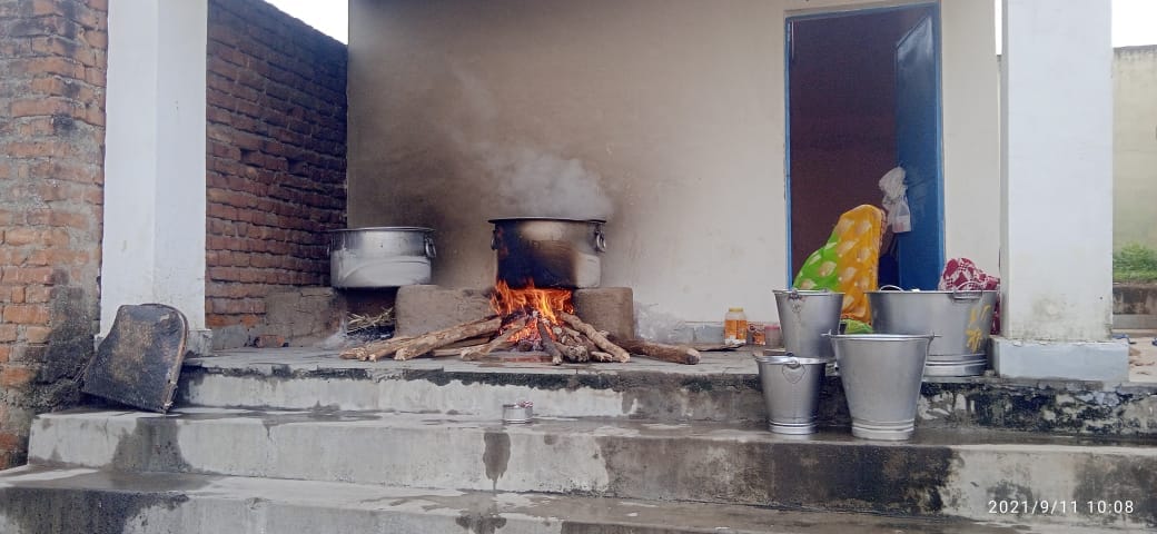 the eyes of the pupils burning in the smoke of the stove