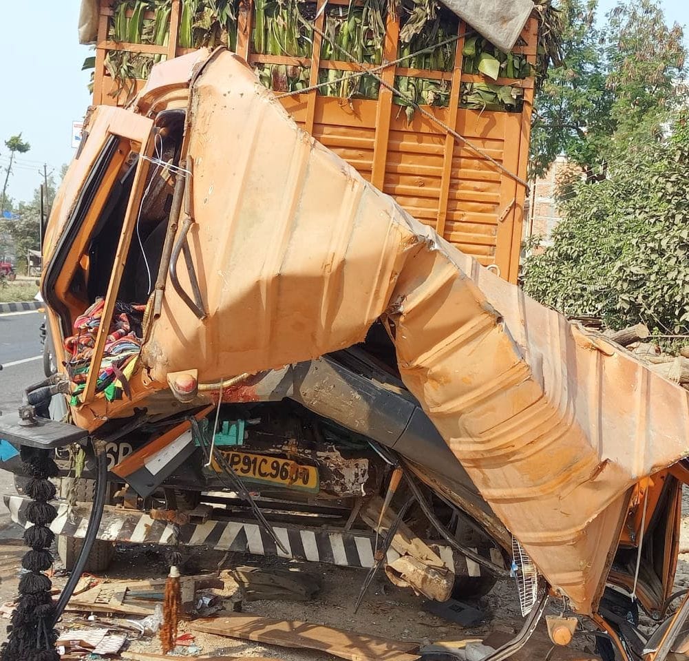 DCM collides with standing container, two killed