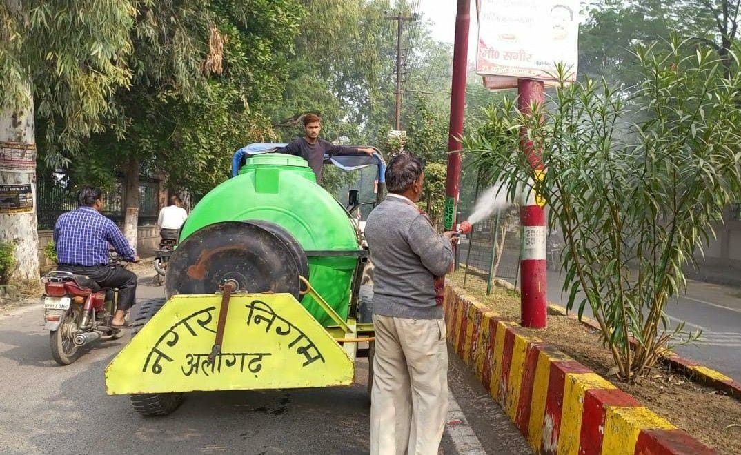 Water sprinkling on roads, washing trees