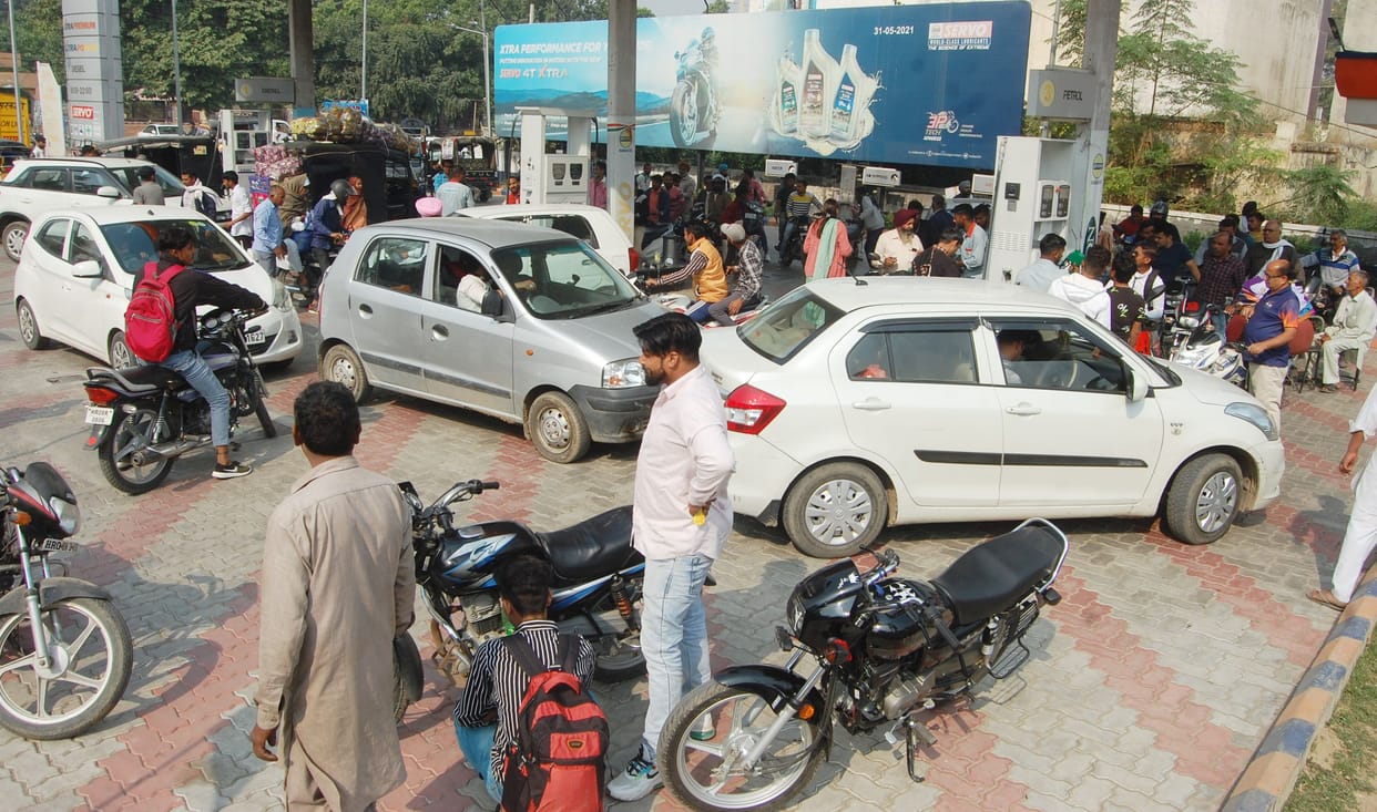 Private petrol pump operators on strike, crowd gathered at government pumps