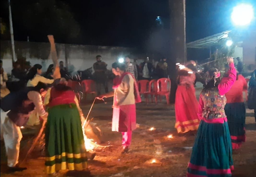 People dance to the beat of Dhol Damaun