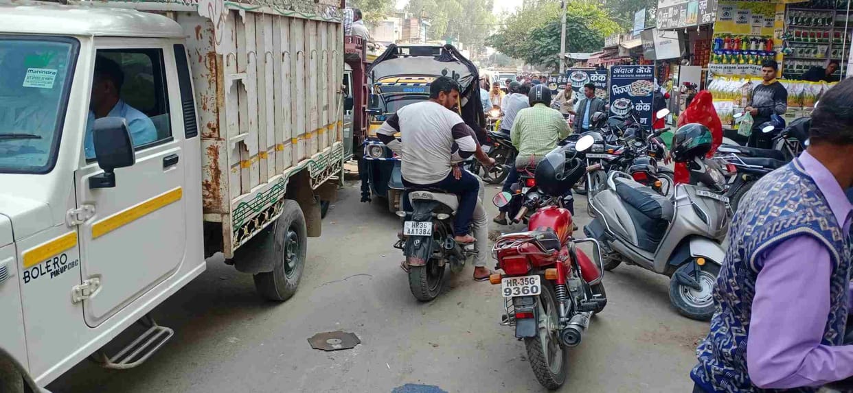 No parking facility in a city with a population of more than one lakh