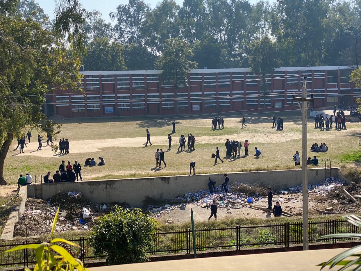 A pond built to collect rain water in the school was converted into a garbage dump