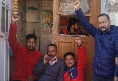 Members sitting on dharna for water