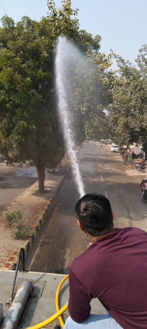 Water sprinkling done to reduce the increasing pollution due to dust