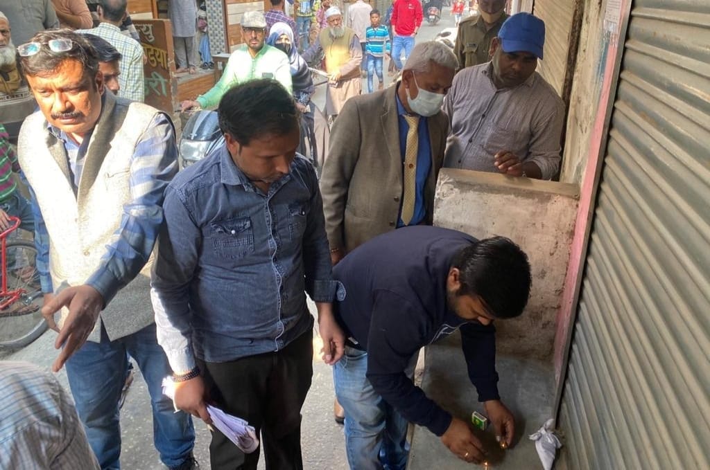 Corporation sealed seven shops for not paying house tax