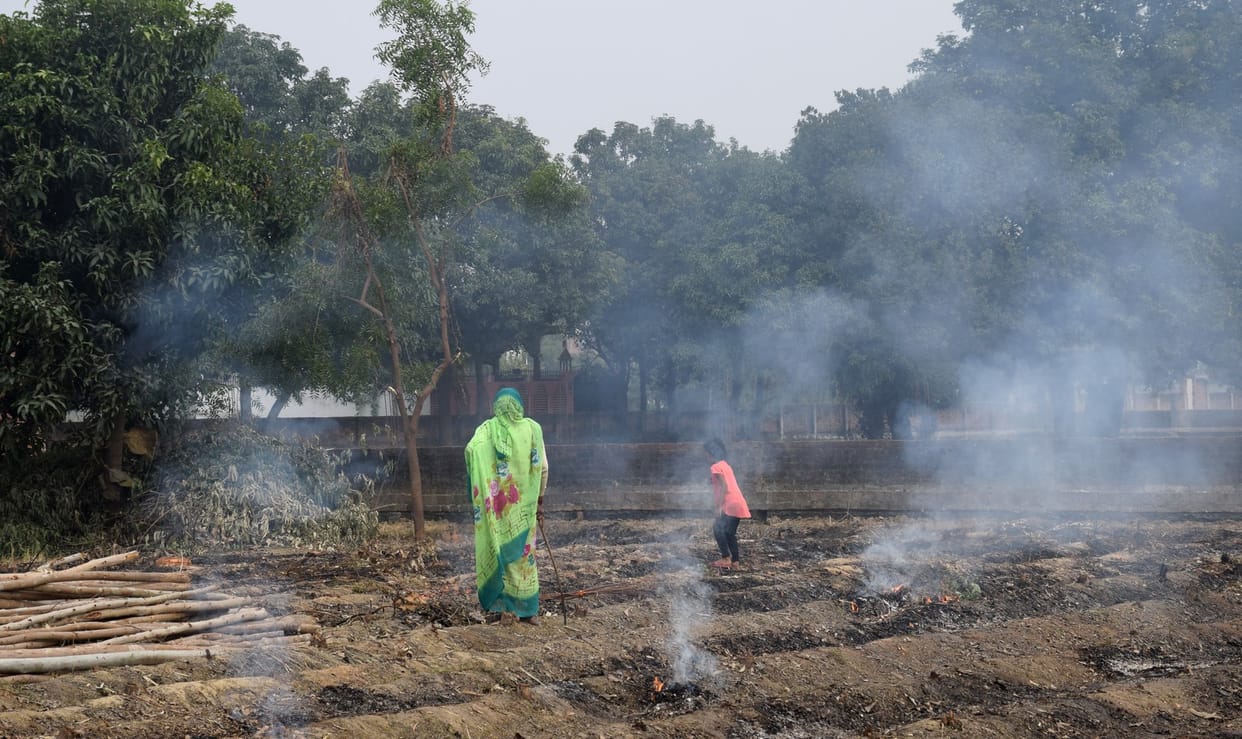Vehicles spewing smoke and burning garbage are dissolving poison in the city's climate