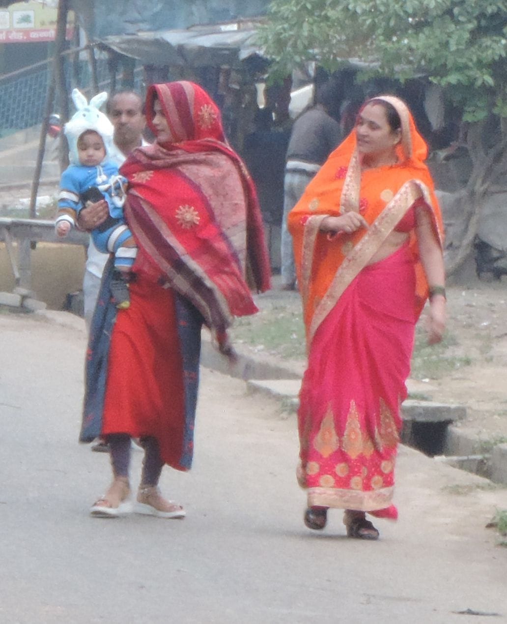 The coldness increased due to drizzle, people came out in warm clothes