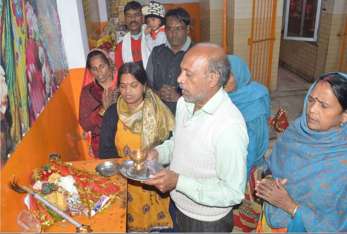 Priests applying ointment after bandaging Laddu Gopal hand in Agra