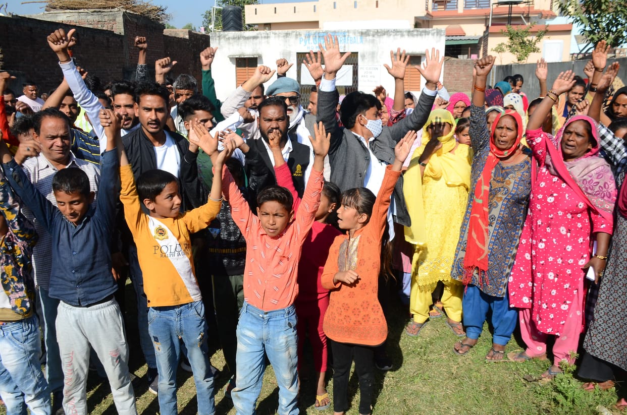 People protested demanding a ban on illegal liquor business
