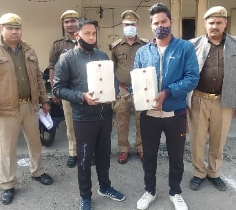 Two arrested for carrying liquor in train