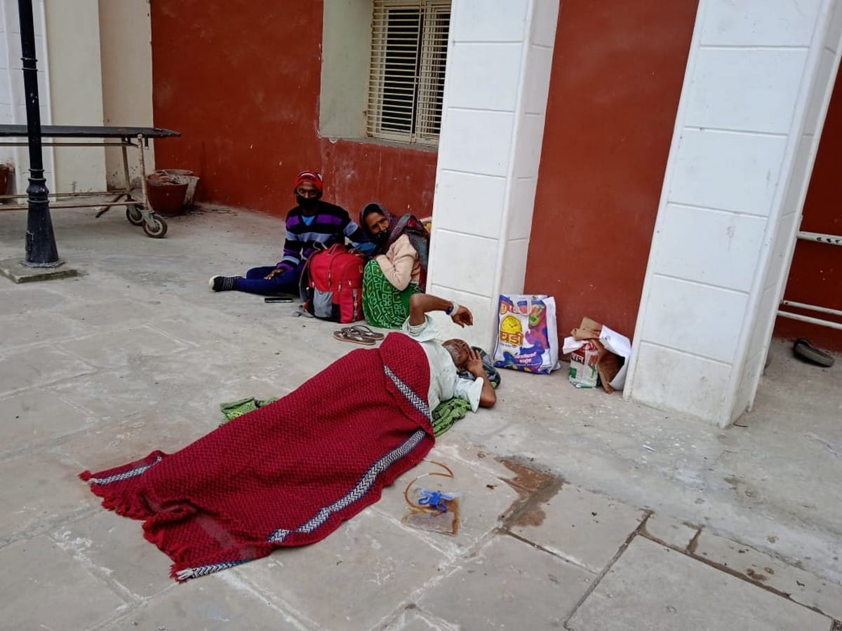 BHU Hospital: patient lay down on floor no doctors and nurses checking up him relatives kept wandering for stretcher