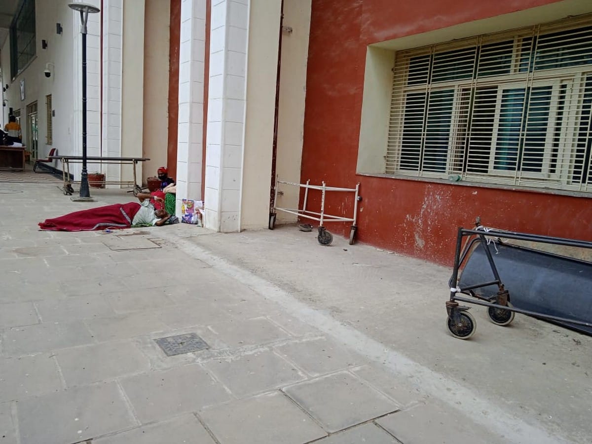 BHU Hospital: patient lay down on floor no doctors and nurses checking up him relatives kept wandering for stretcher
