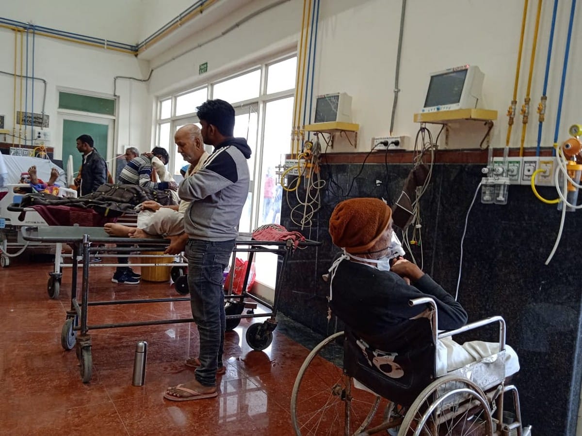 BHU Hospital: patient lay down on floor no doctors and nurses checking up him relatives kept wandering for stretcher