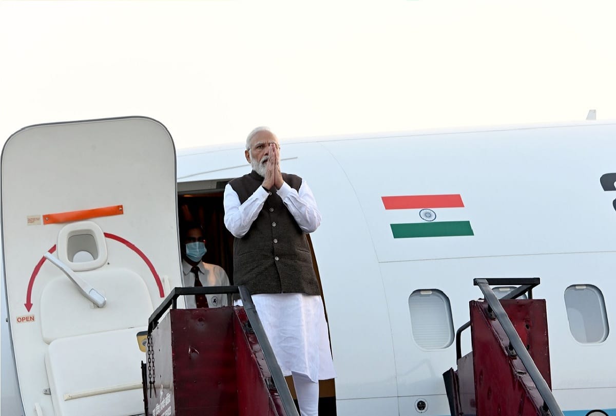 Union Home Minister Amit Shah and Chief Minister Yogi Adityanath greet Prime Minister Narendra Modi at Amausi Airport