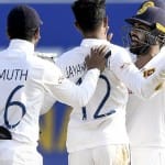 वेस्टइंडीज का विकेट लेने के बाद जश्न मनाते श्रीलंकाई खिलाड़ी।