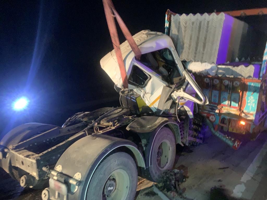 Driver dies in truck collision, body removed after cutting cabin