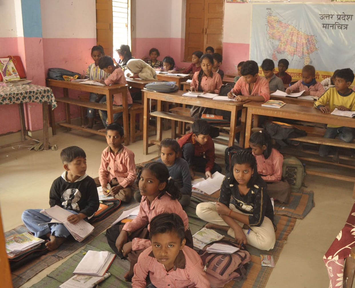 children studying in a room
