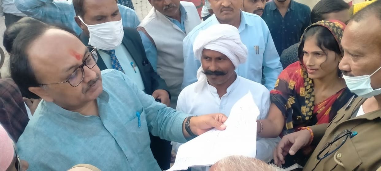 Villagers wandering for the schemes of the Social Welfare Department, surrounded the cabinet minister