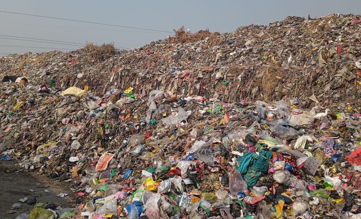 Sanitation rank slipping from the mountain of garbage