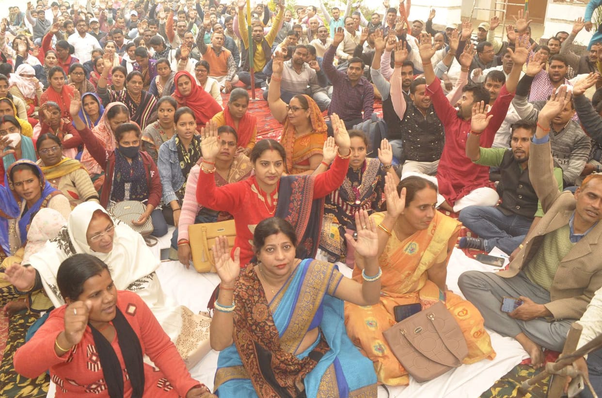 Teachers and employees staged a sit-in