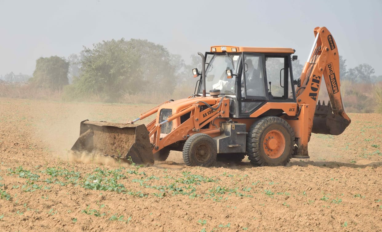 Possession removed... In 30 minutes, mustard crop planted in 32 acres was trampled by JCB
