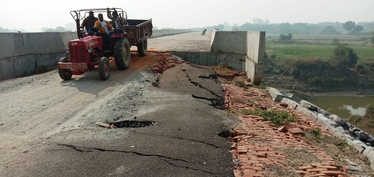 Crack in the railing of the bridge before the inauguration in Andaya village, the approach road