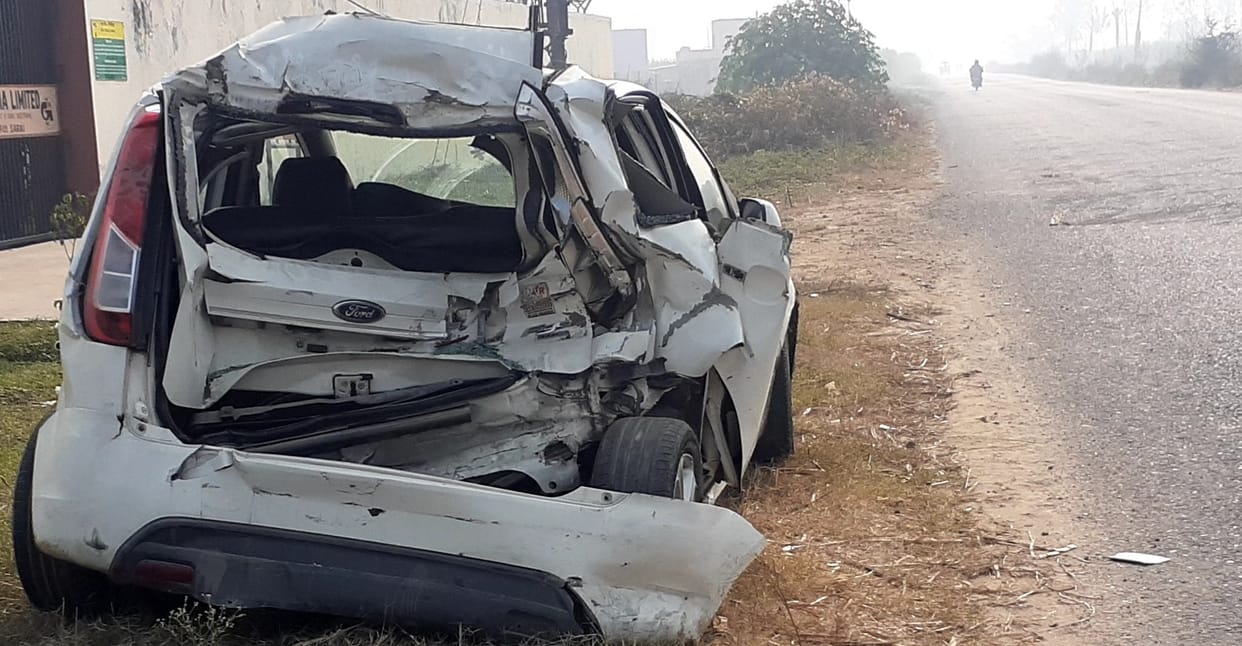 Car collided with truck on highway, two injured