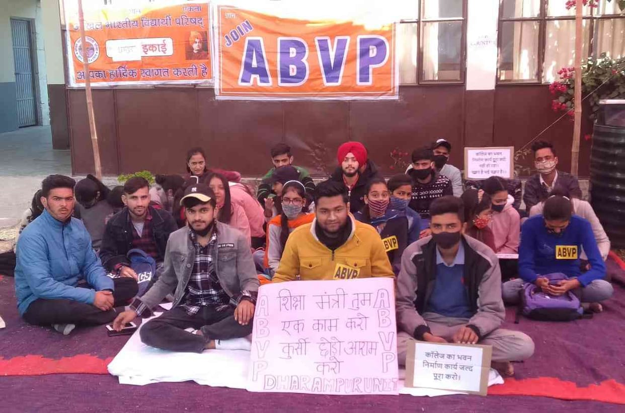 ABVP activists shout slogans against education minister in Dharampur college
