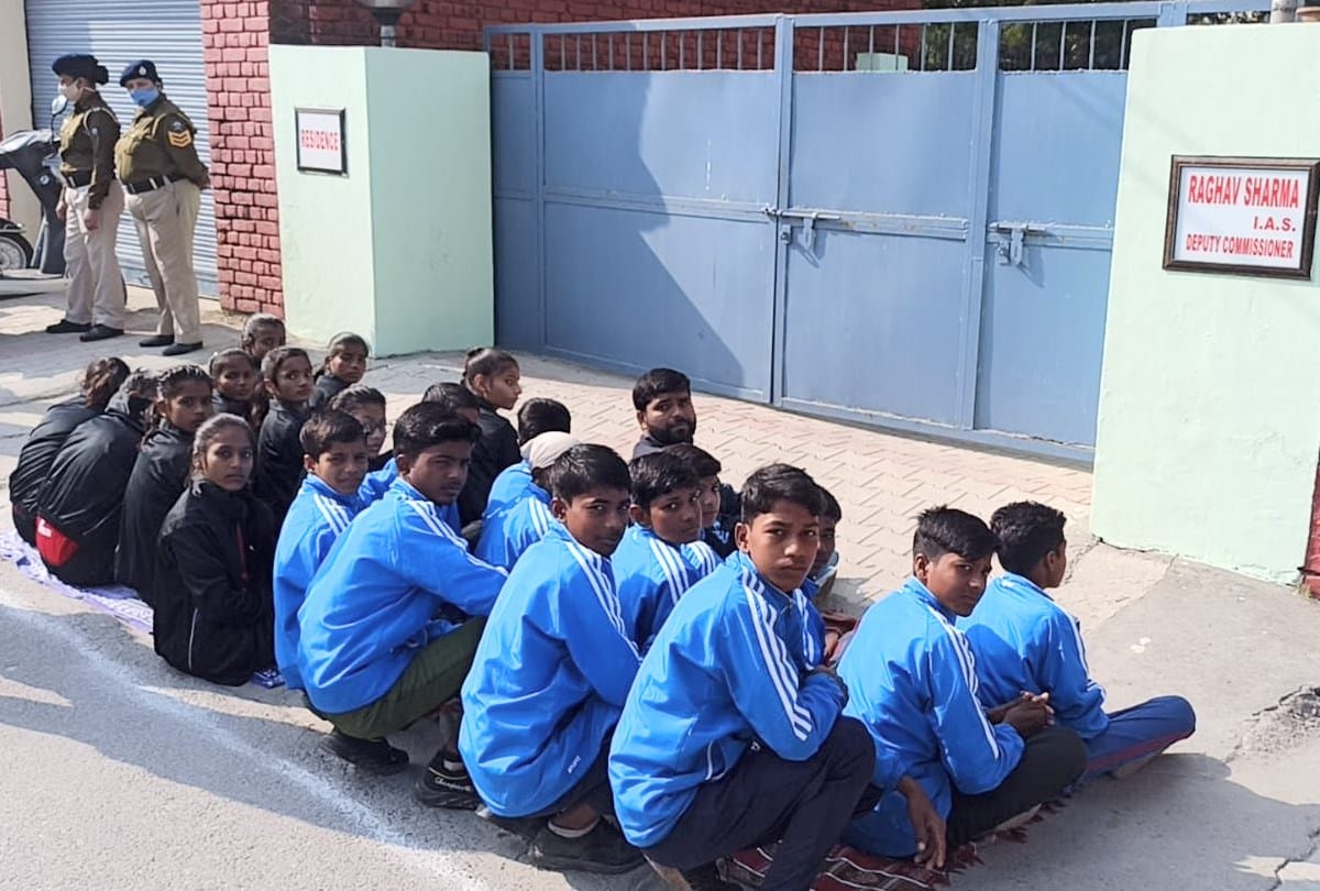sub junior kho kho championship players sit outside dc residence in una