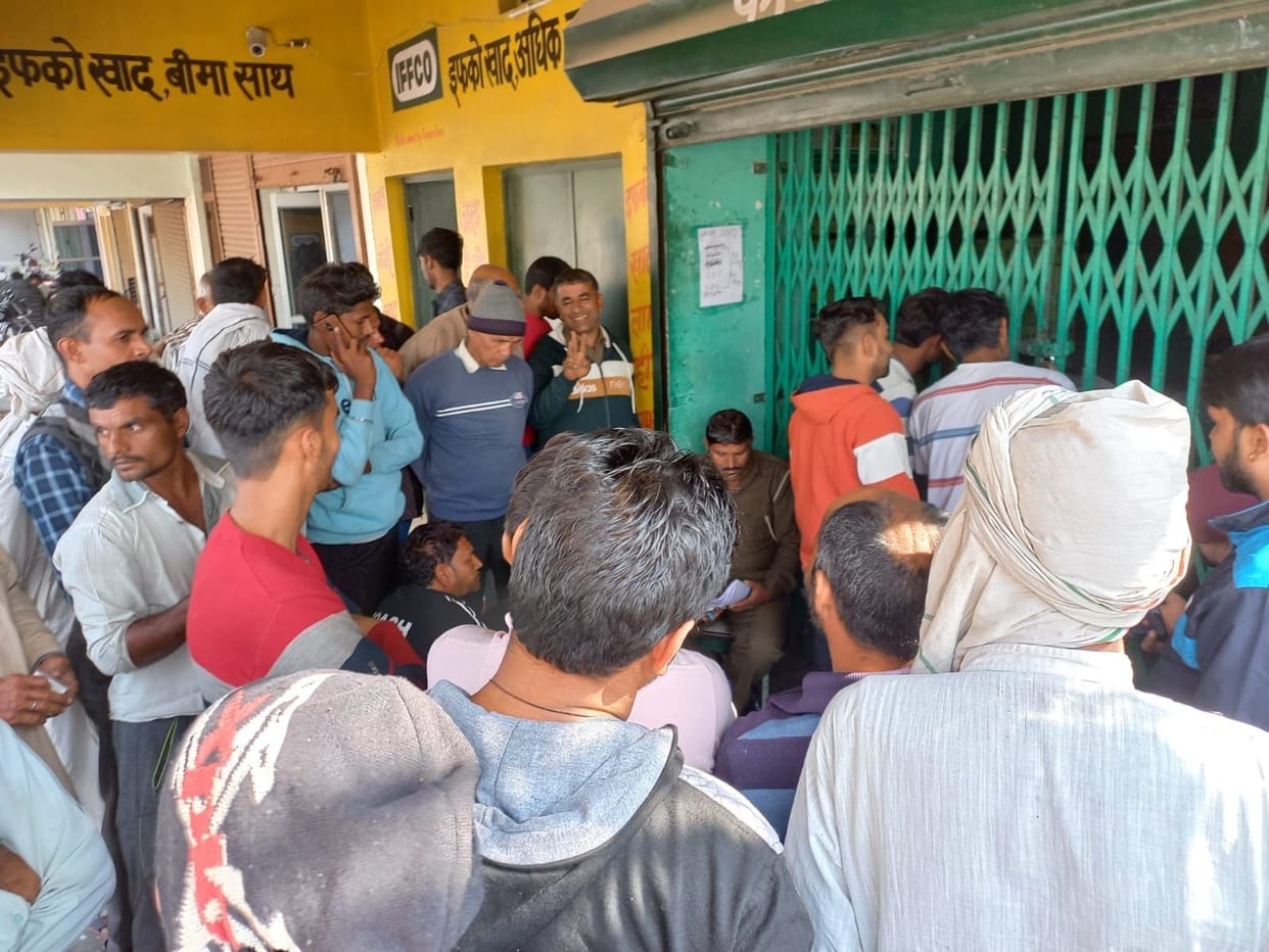 Crowd of farmers at sales centers for urea and DAP