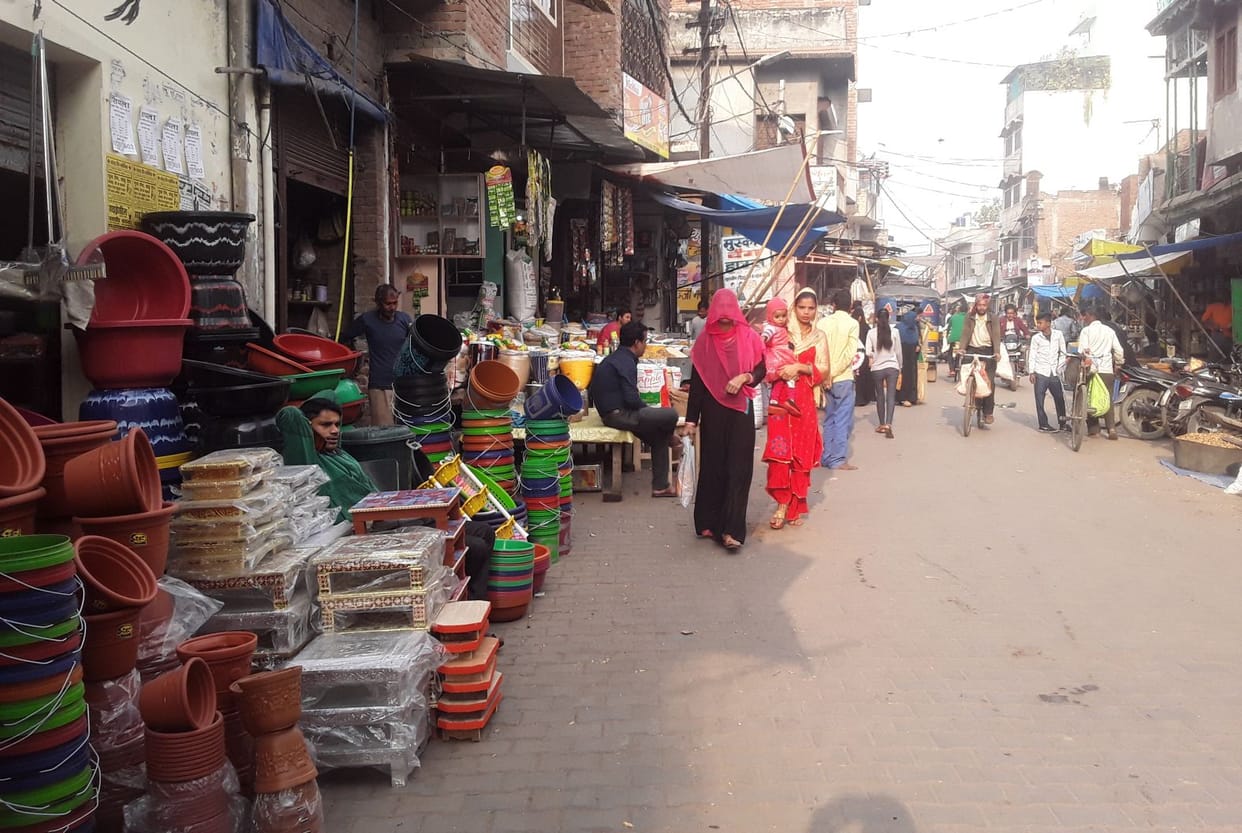 Shops on the road, jammed with customers' vehicles on the road