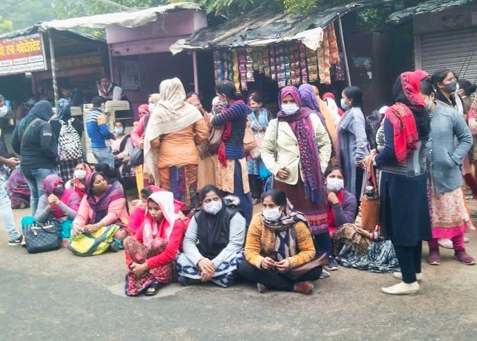 Contract workers shouted slogans outside CMO office