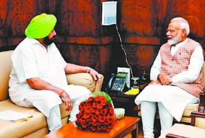 प्रधानमंत्री नरेंद्र मोदी के साथ कैप्टन अमरिंदर सिंह।