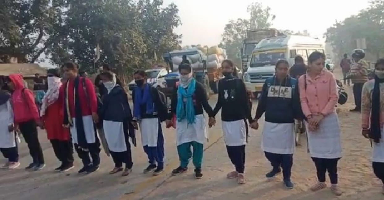 The girl students blocked the road for one and a half hours due to the bus service not being restored