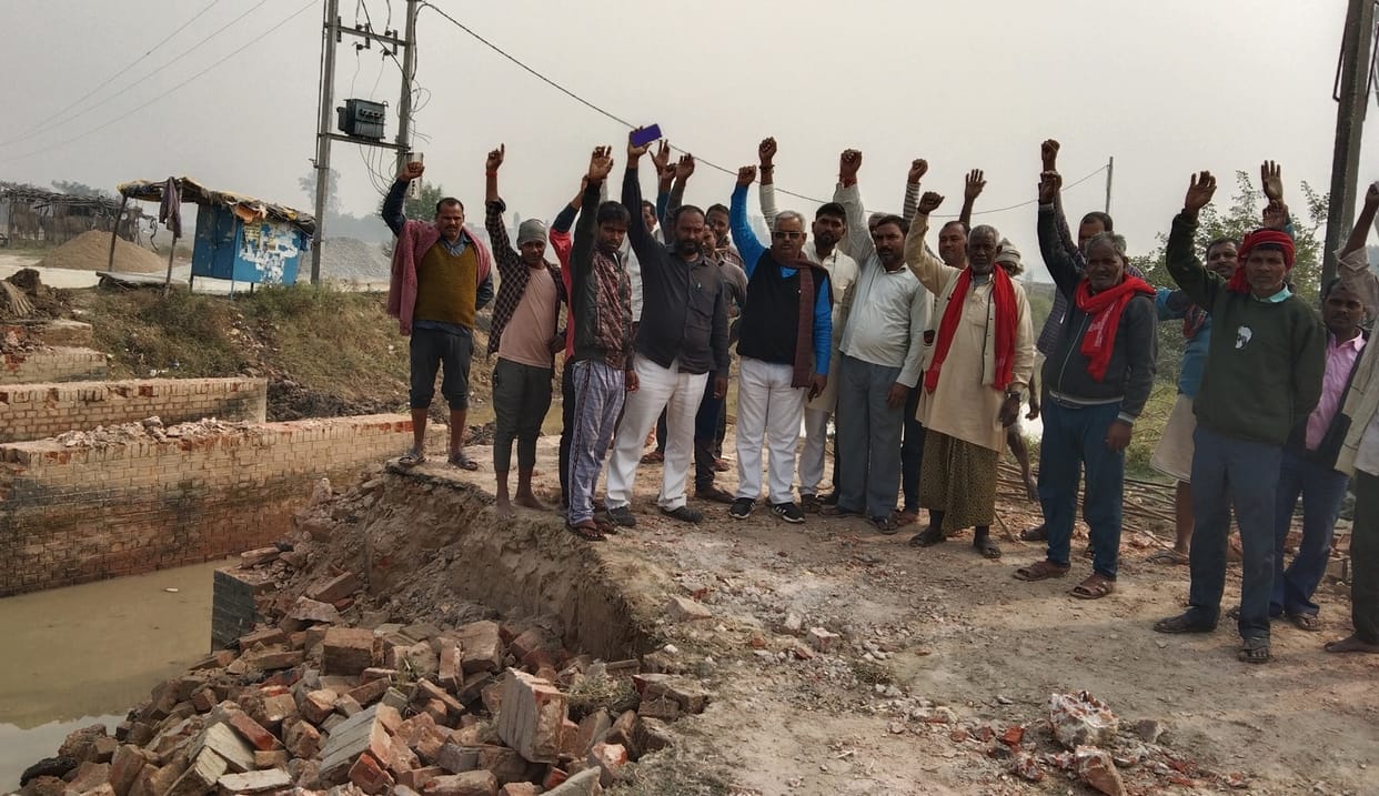 Angry over the breaking of the culvert, protested