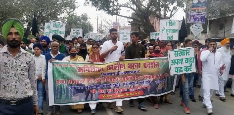 A foot march was taken out demanding payment of outstanding sugarcane