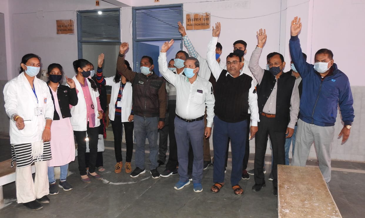 Health workers did the work by tying a black band