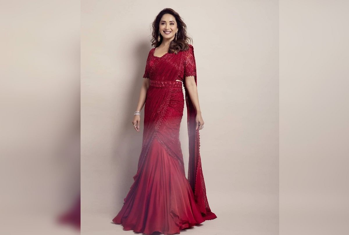 Madhuri Dixit looks elegant in red pre-stitched sequin saree