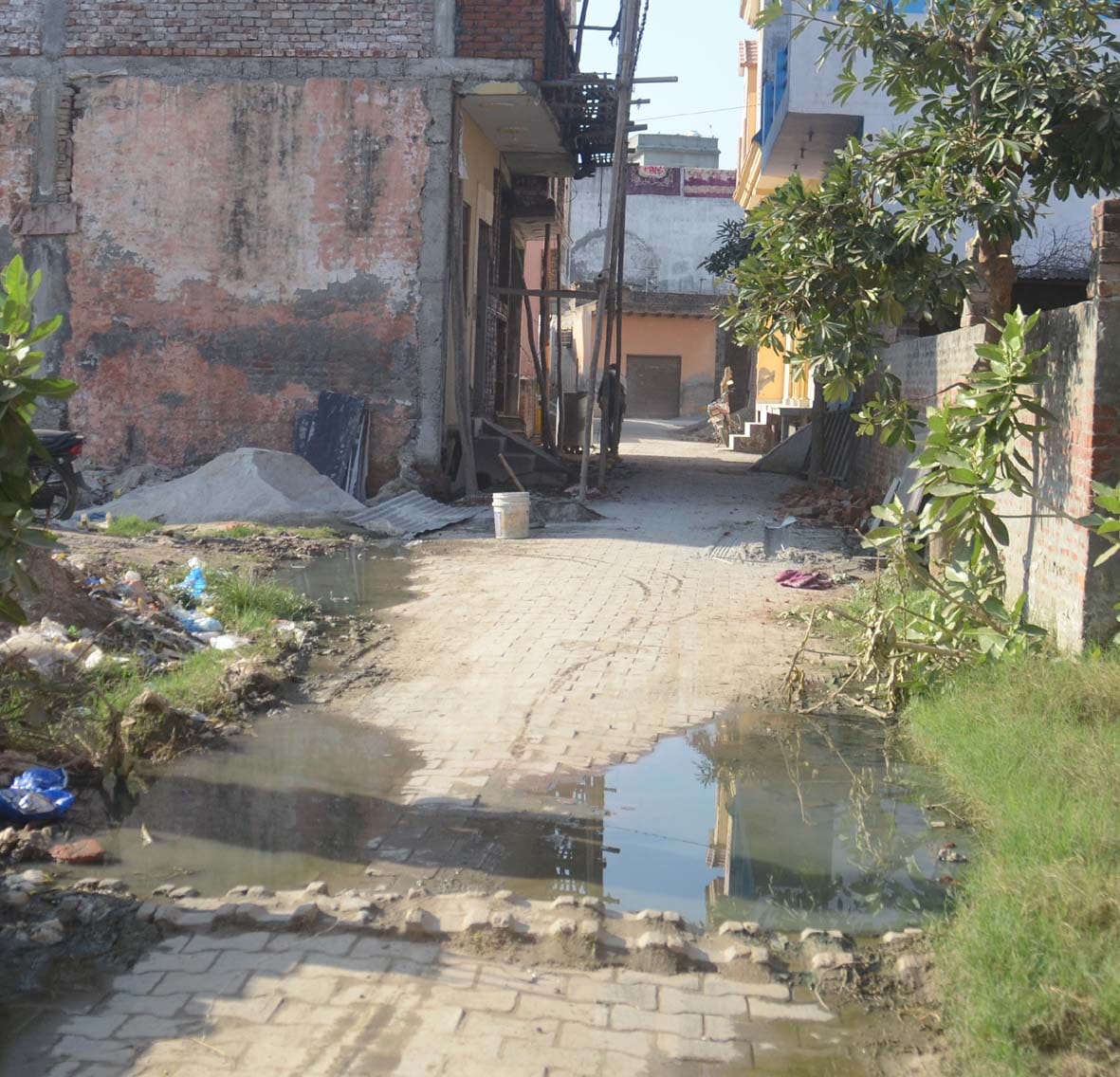 Identification of these colonies, pucca houses on the side of unpaved roads