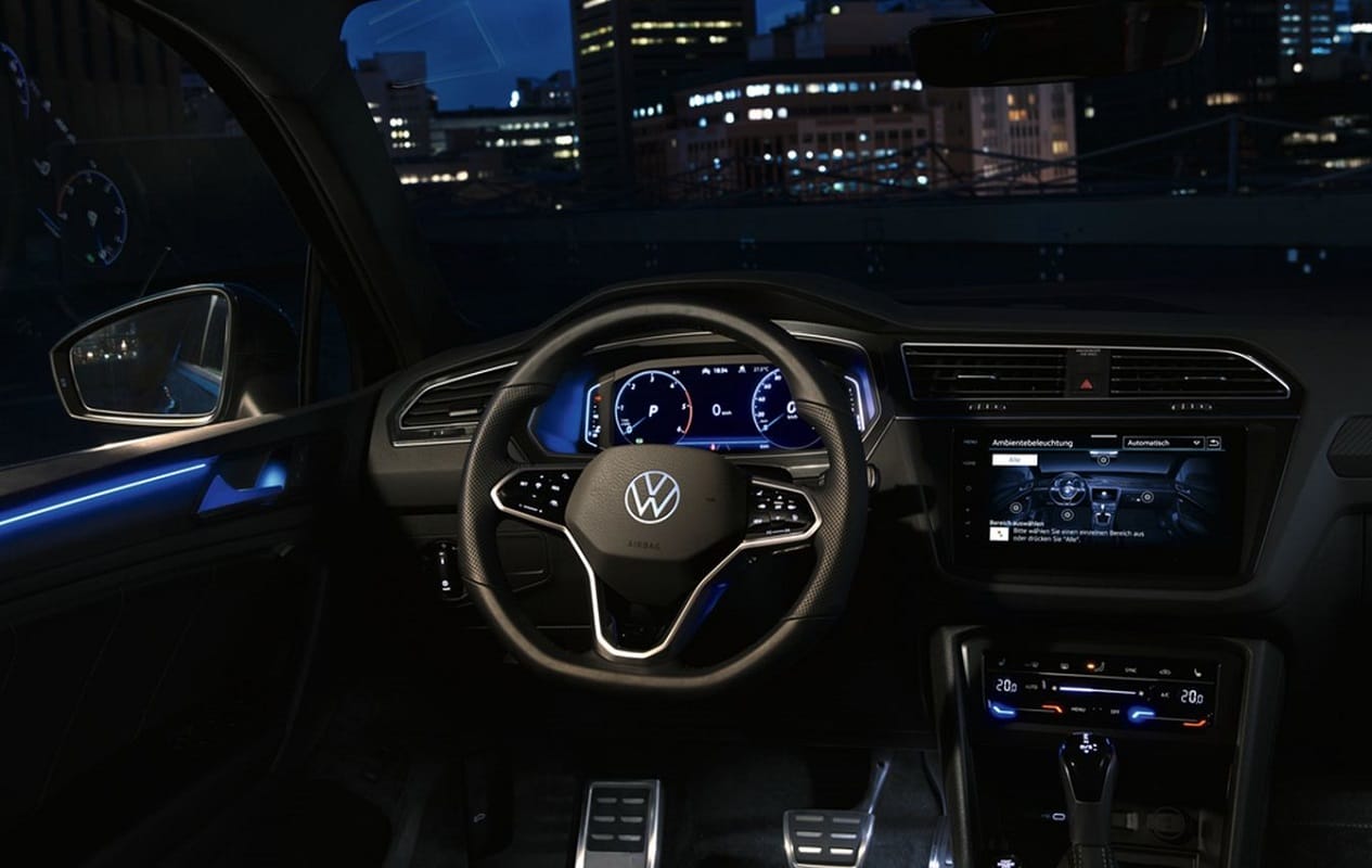 volkswagen india enhance flagship suv tiguan with dual tone interior wireless charger rde compliant