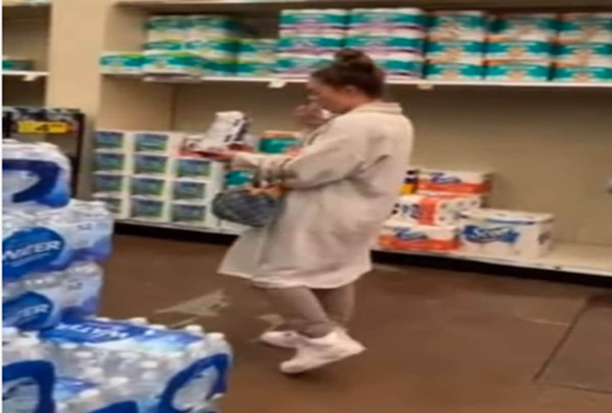 woman spitting in food lady spit into chips and water bottle at shopping mall
