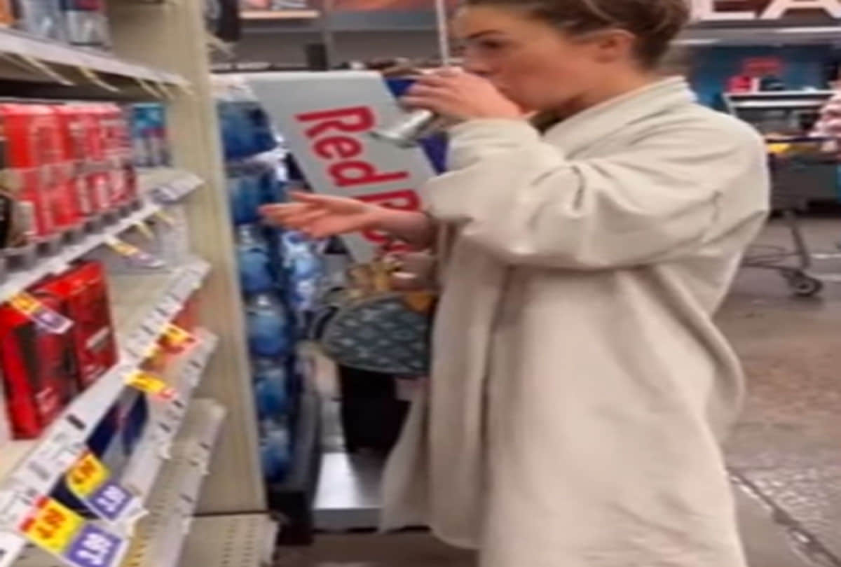 woman spitting in food lady spit into chips and water bottle at shopping mall