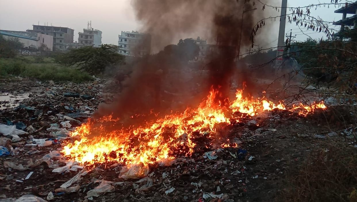 burning garbage, flying dust