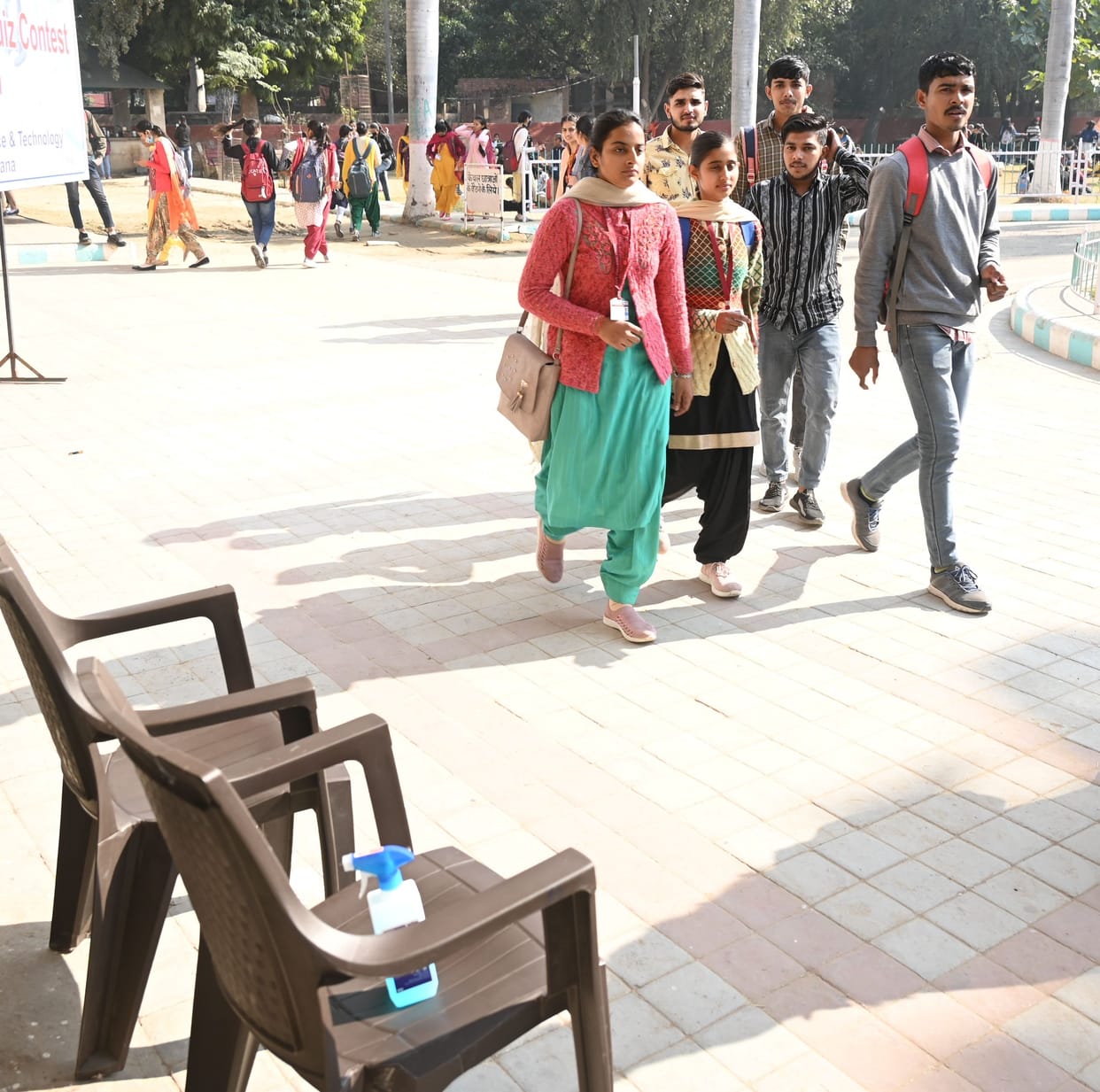 Students roaming in colleges without masks, screening or washing hands with sanitizer