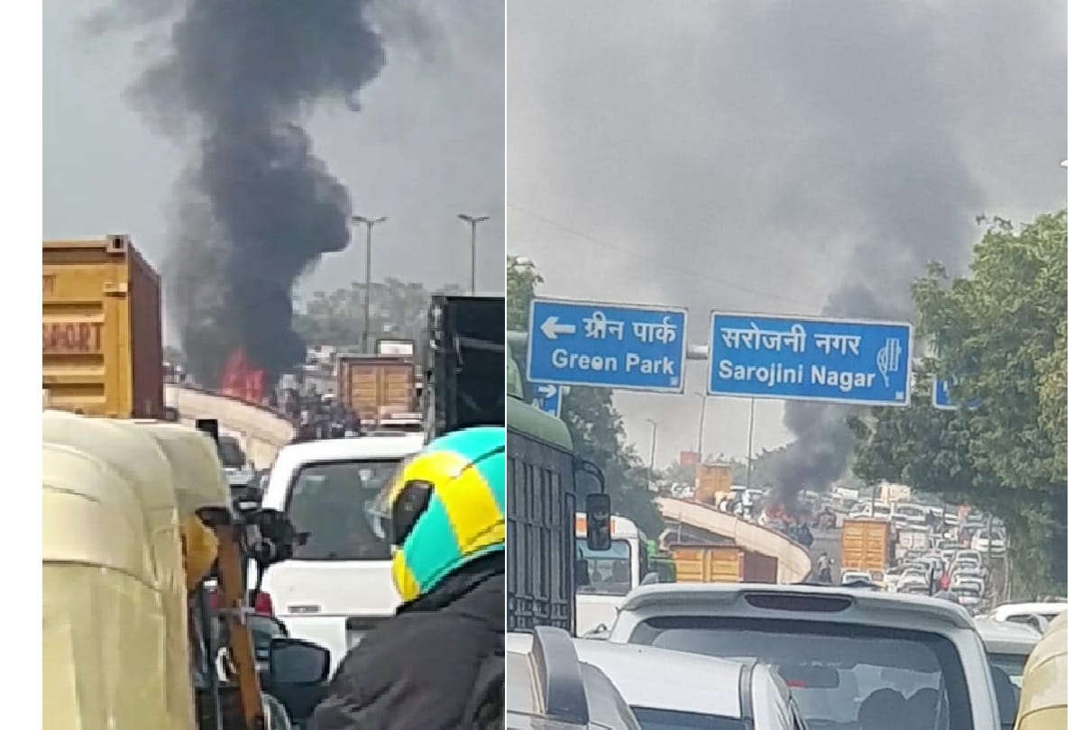 car caught fire on Sarojini Nagar flyover Delhi